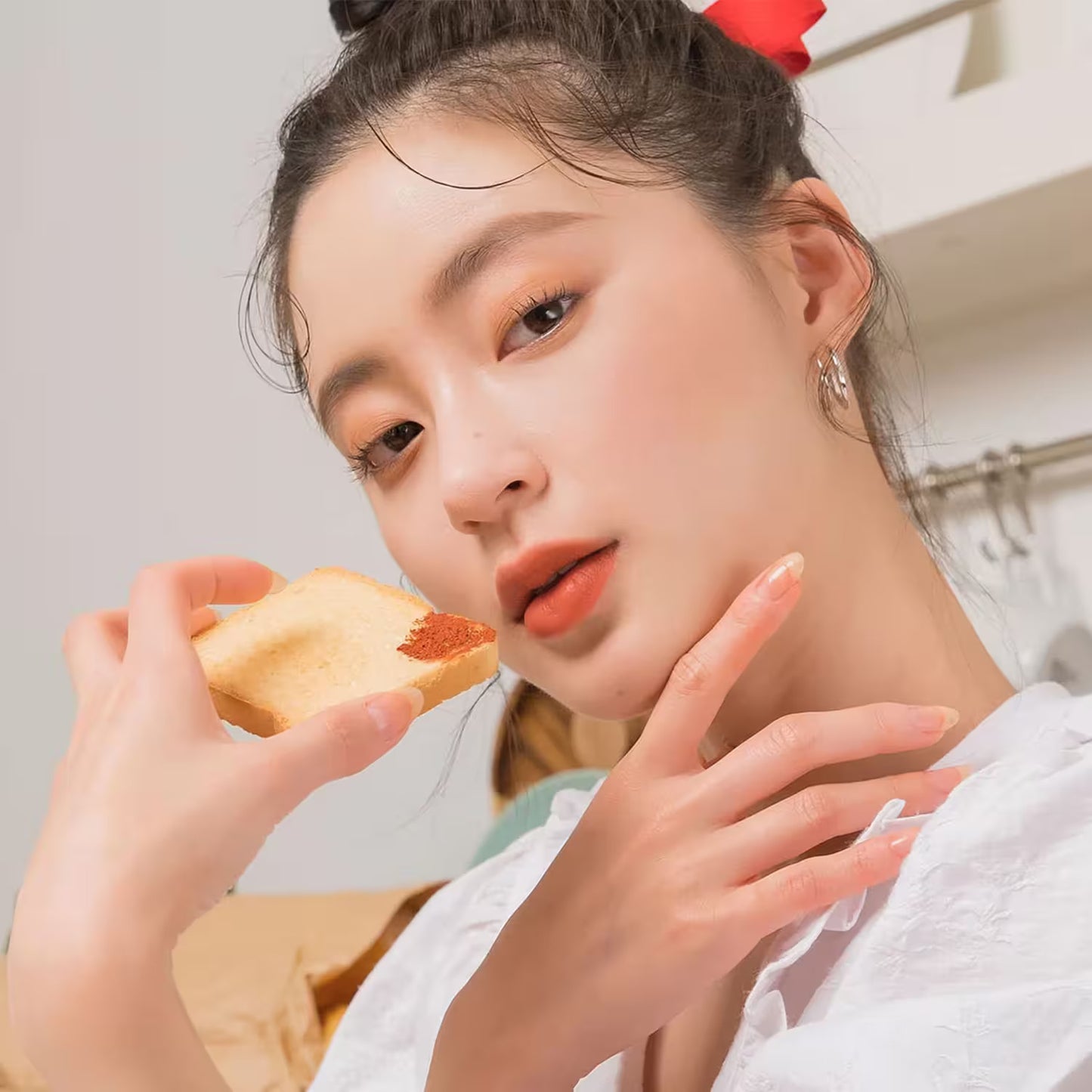 Model wearing Rom&nd Zero Velvet Tint 15 Rusk Rusk – Soft blur finish lip tint from Korea
